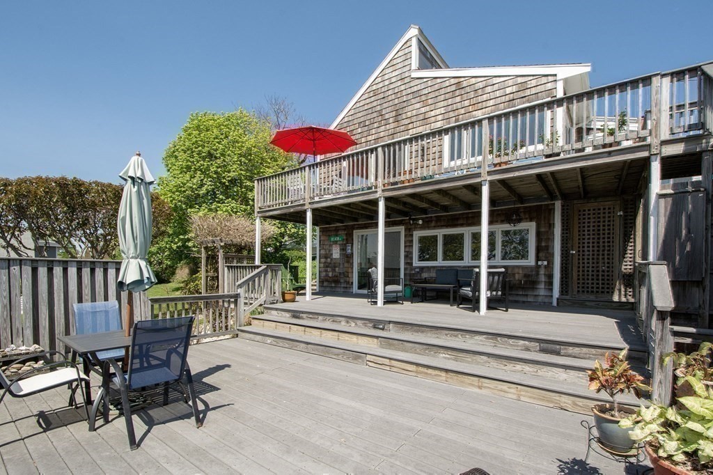 7 Bluff Road Hull, MA 02045 - Photo 32 of 35 a balcony with table and chairs