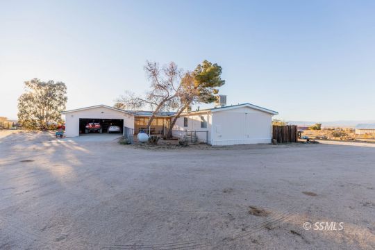 1221 Nocturne Street Ridgecrest, CA 93555 - Photo 2 of 32 a view of house with outdoor space