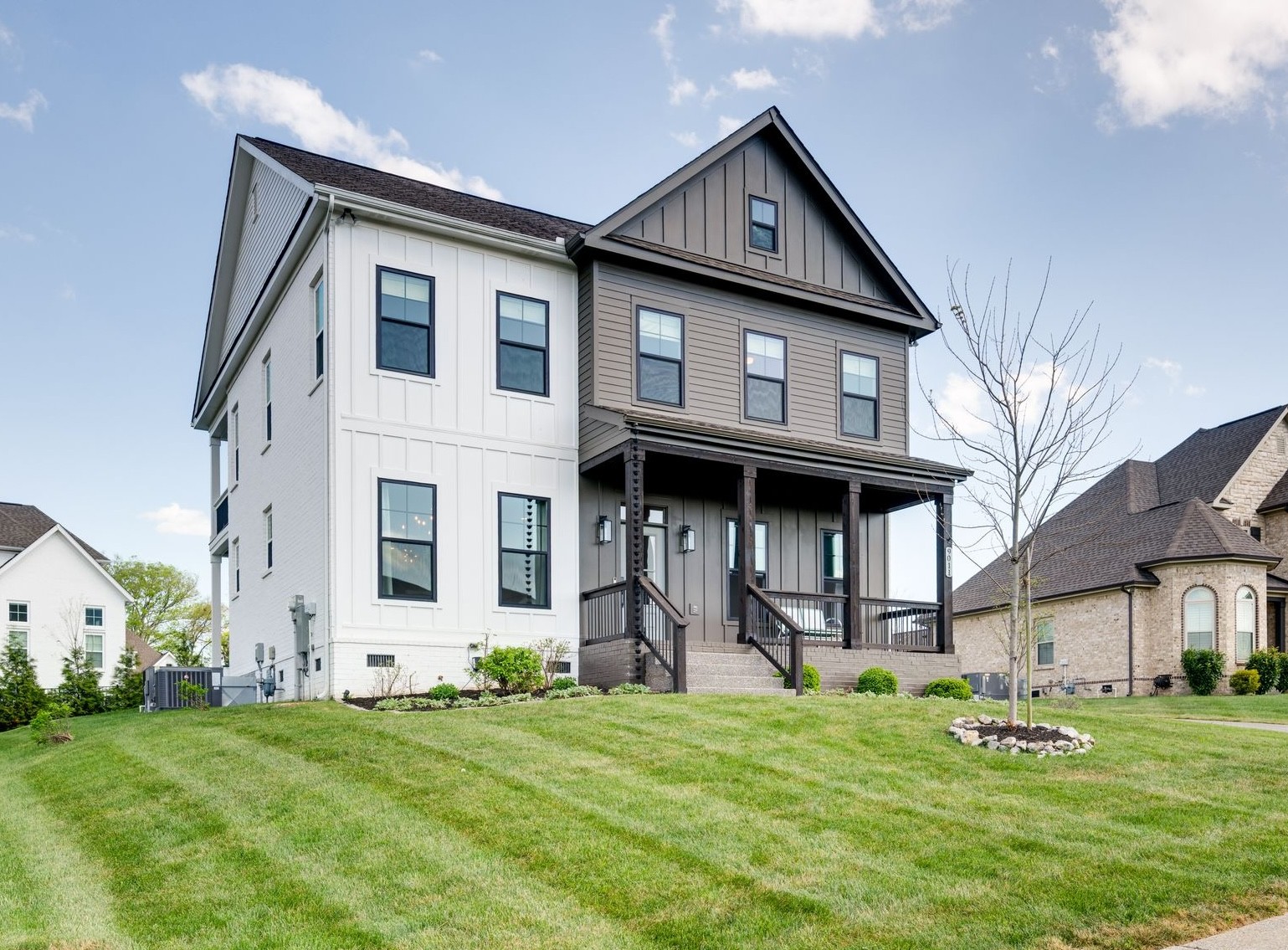 a front view of a house with a yard