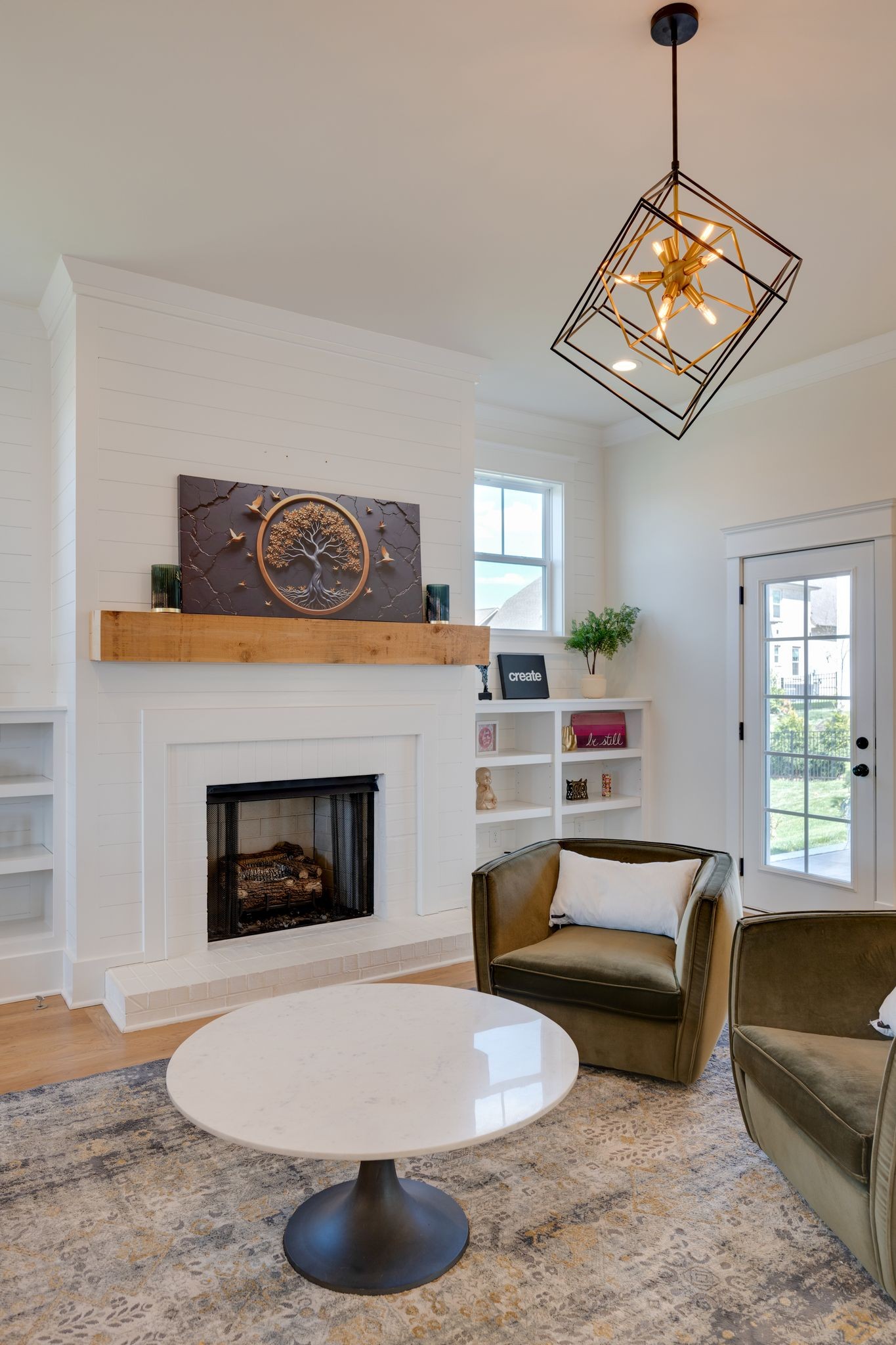9011 Safehaven Place Spring Hill, TN 37174 - Photo 11 of 49 a living room with furniture and a fireplace