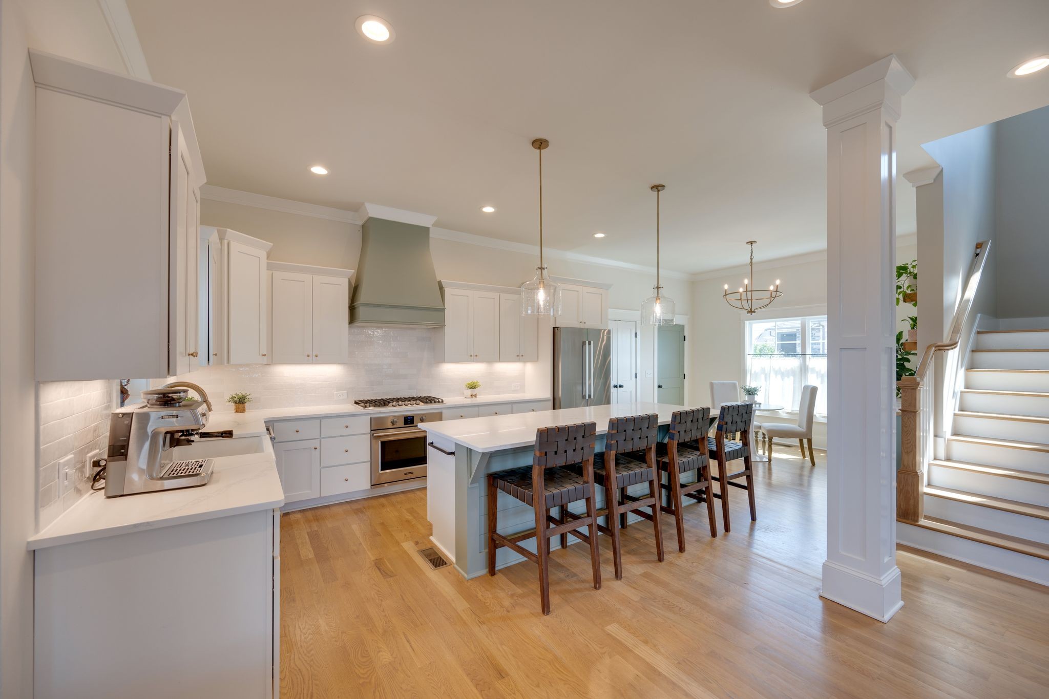 9011 Safehaven Place Spring Hill, TN 37174 - Photo 12 of 49 a large kitchen with a table and chairs