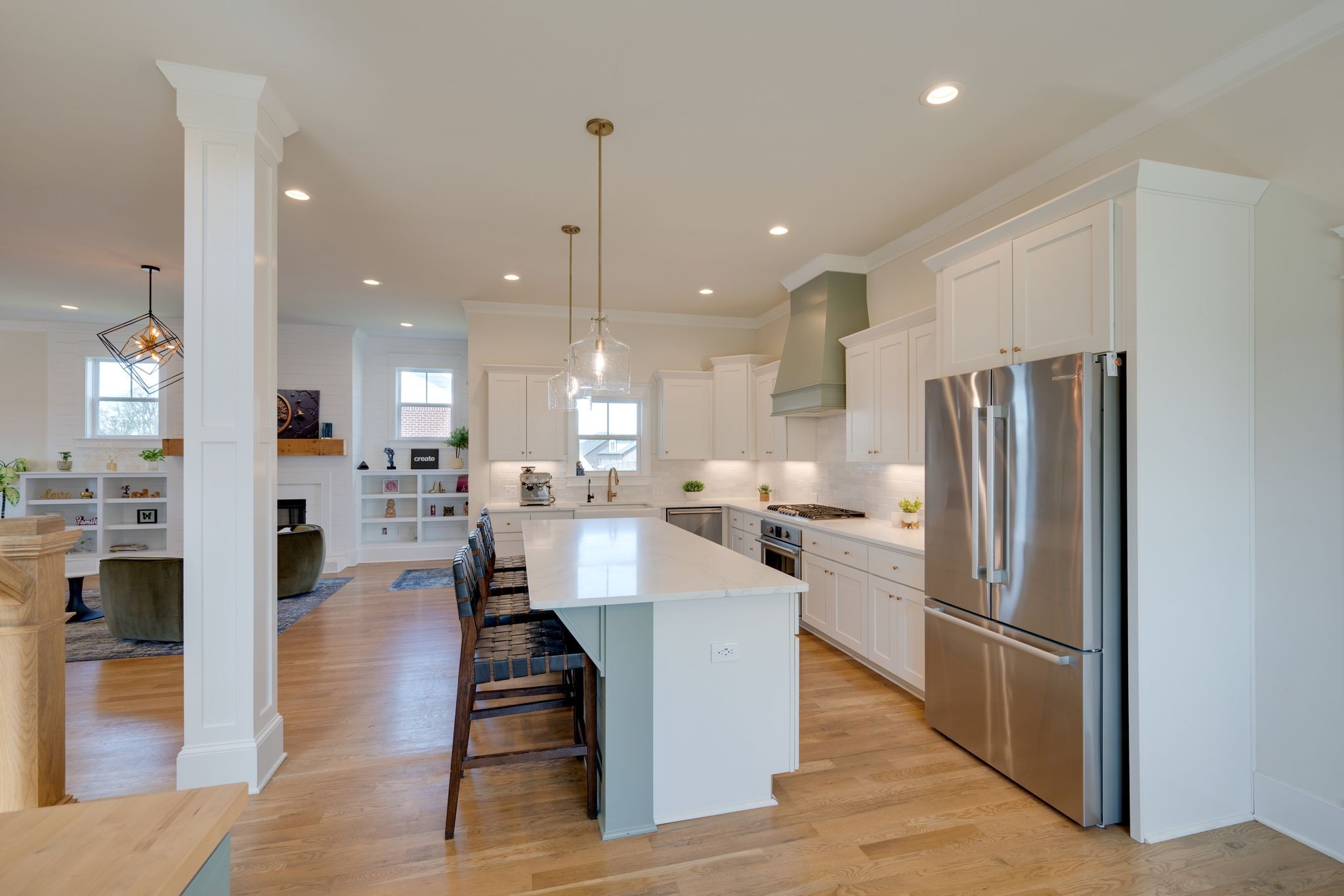 9011 Safehaven Place Spring Hill, TN 37174 - Photo 13 of 49 a large kitchen with a table and chairs