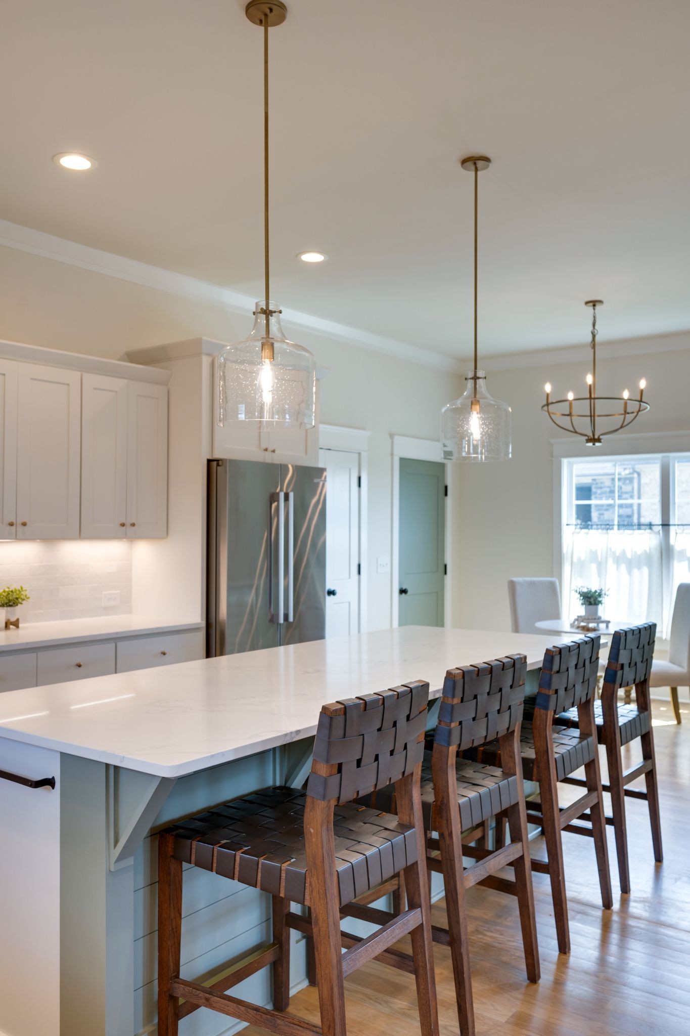 9011 Safehaven Place Spring Hill, TN 37174 - Photo 15 of 49 a kitchen with a table and chairs in it