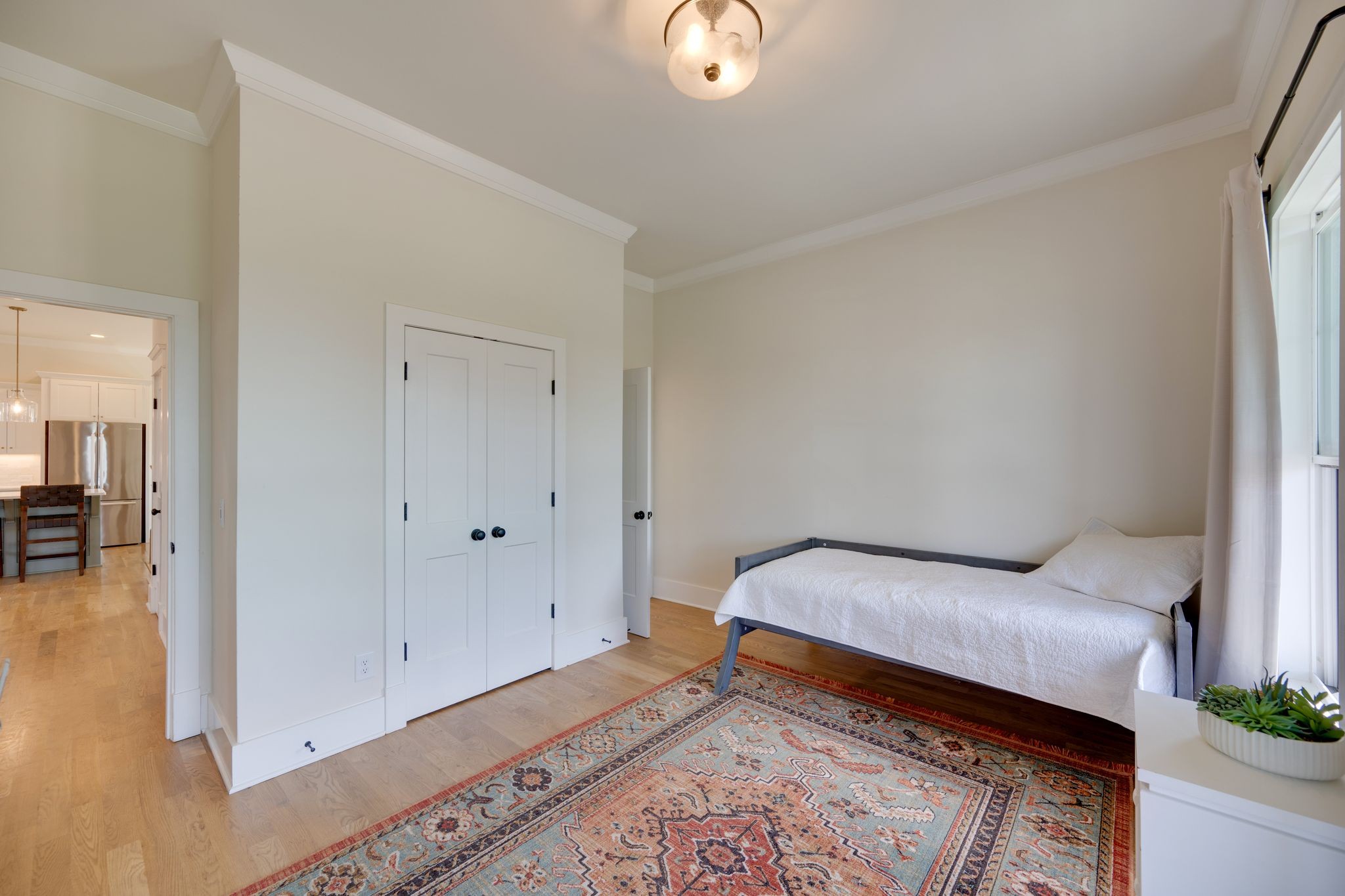 9011 Safehaven Place Spring Hill, TN 37174 - Photo 22 of 49 a room with a bed and a table