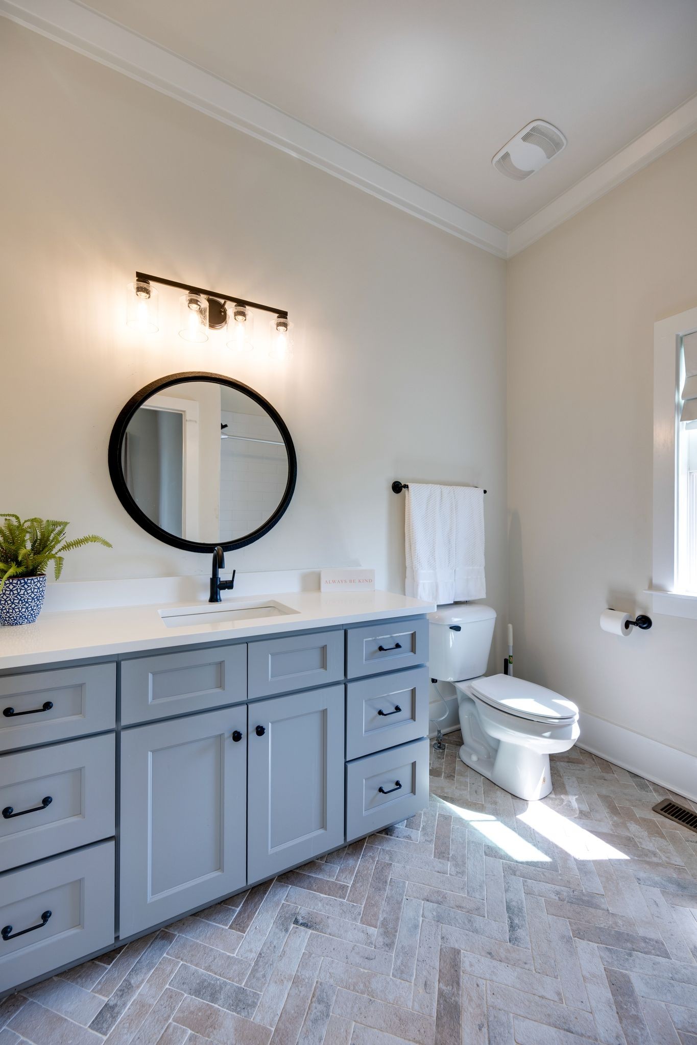 9011 Safehaven Place Spring Hill, TN 37174 - Photo 23 of 49 a bathroom with a toilet a sink and a mirror