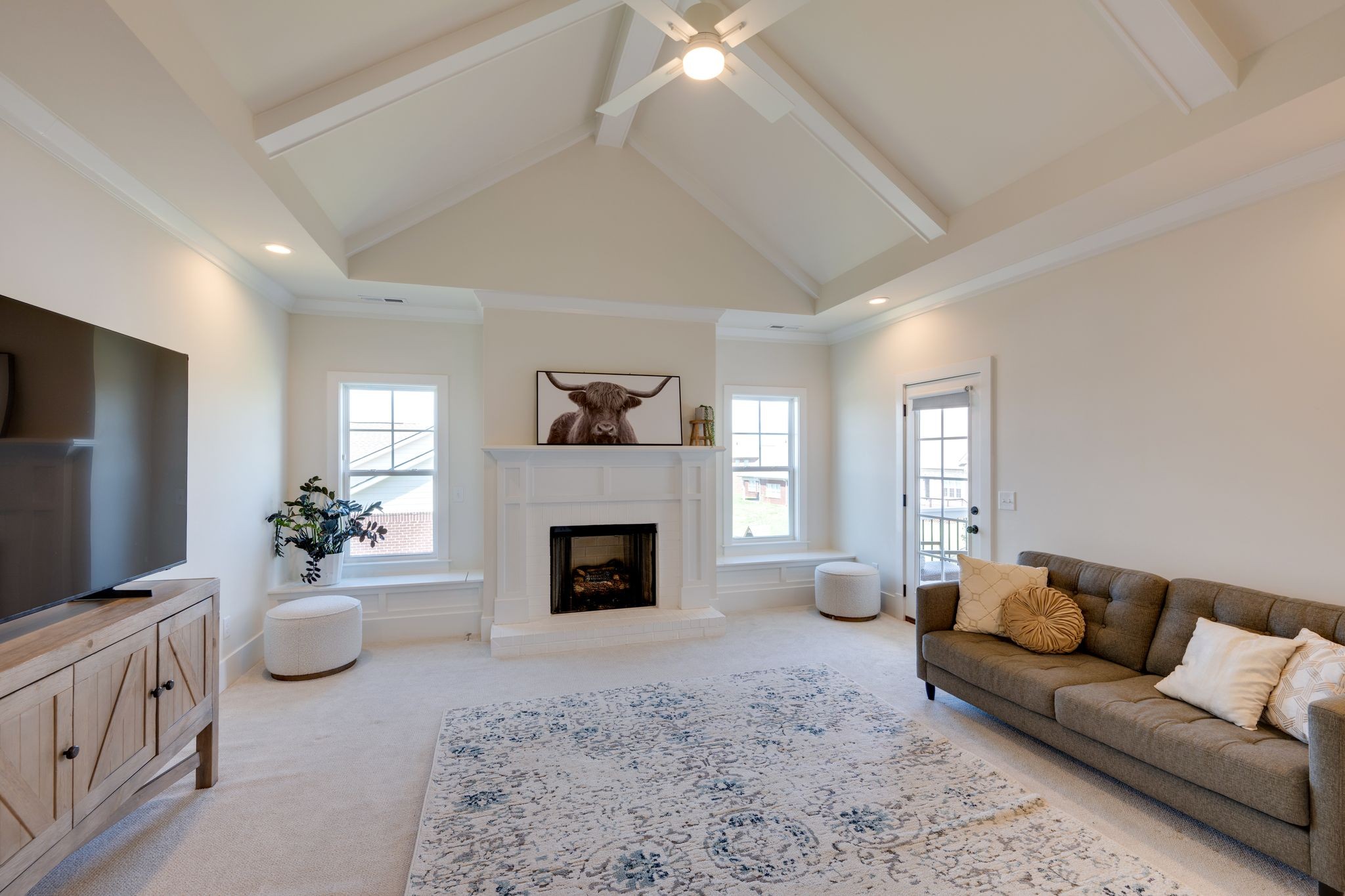 9011 Safehaven Place Spring Hill, TN 37174 - Photo 27 of 49 a living room with furniture and a fireplace