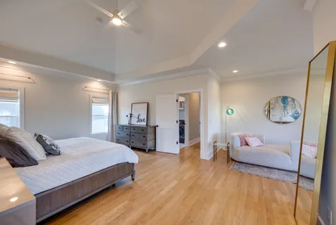 a hotel room with a bed and furniture