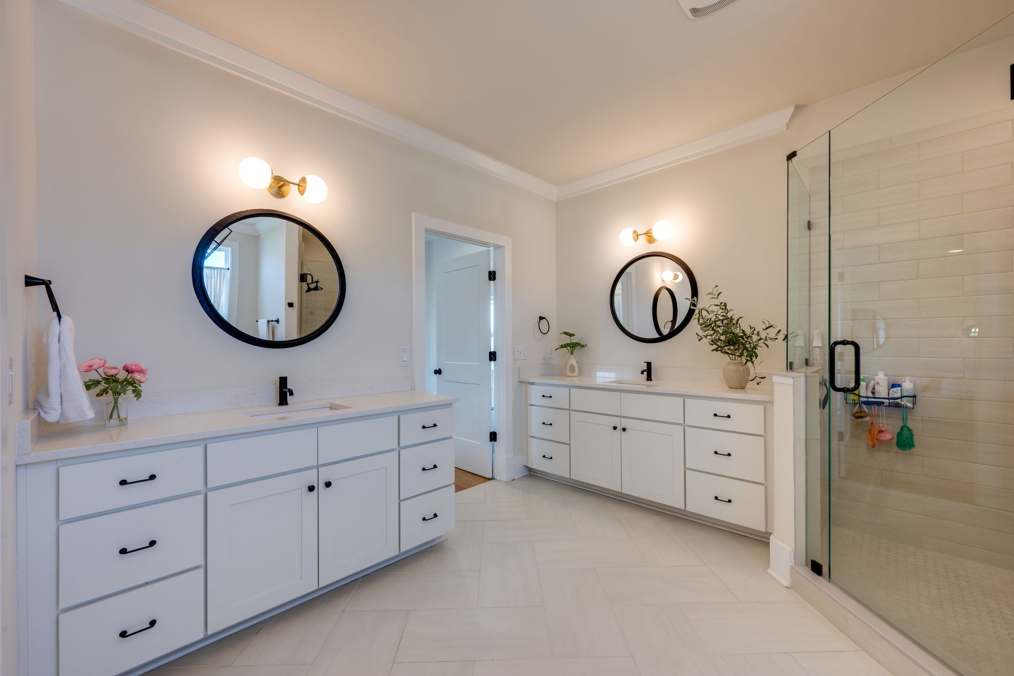 9011 Safehaven Place Spring Hill, TN 37174 - Photo 36 of 49 a spacious bathroom with double vanity and a mirror