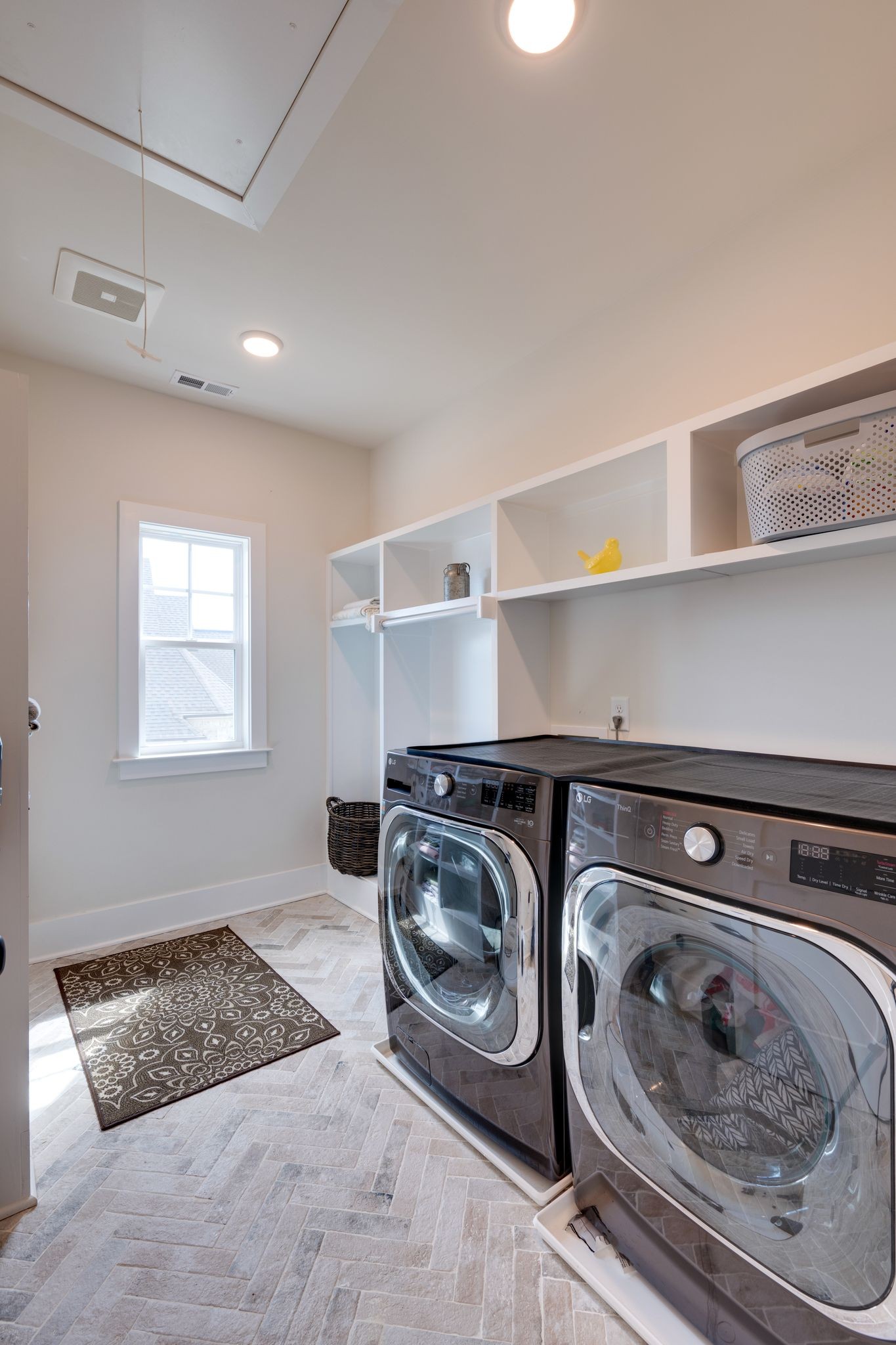 9011 Safehaven Place Spring Hill, TN 37174 - Photo 38 of 49 a utility room with closet dryer and washer