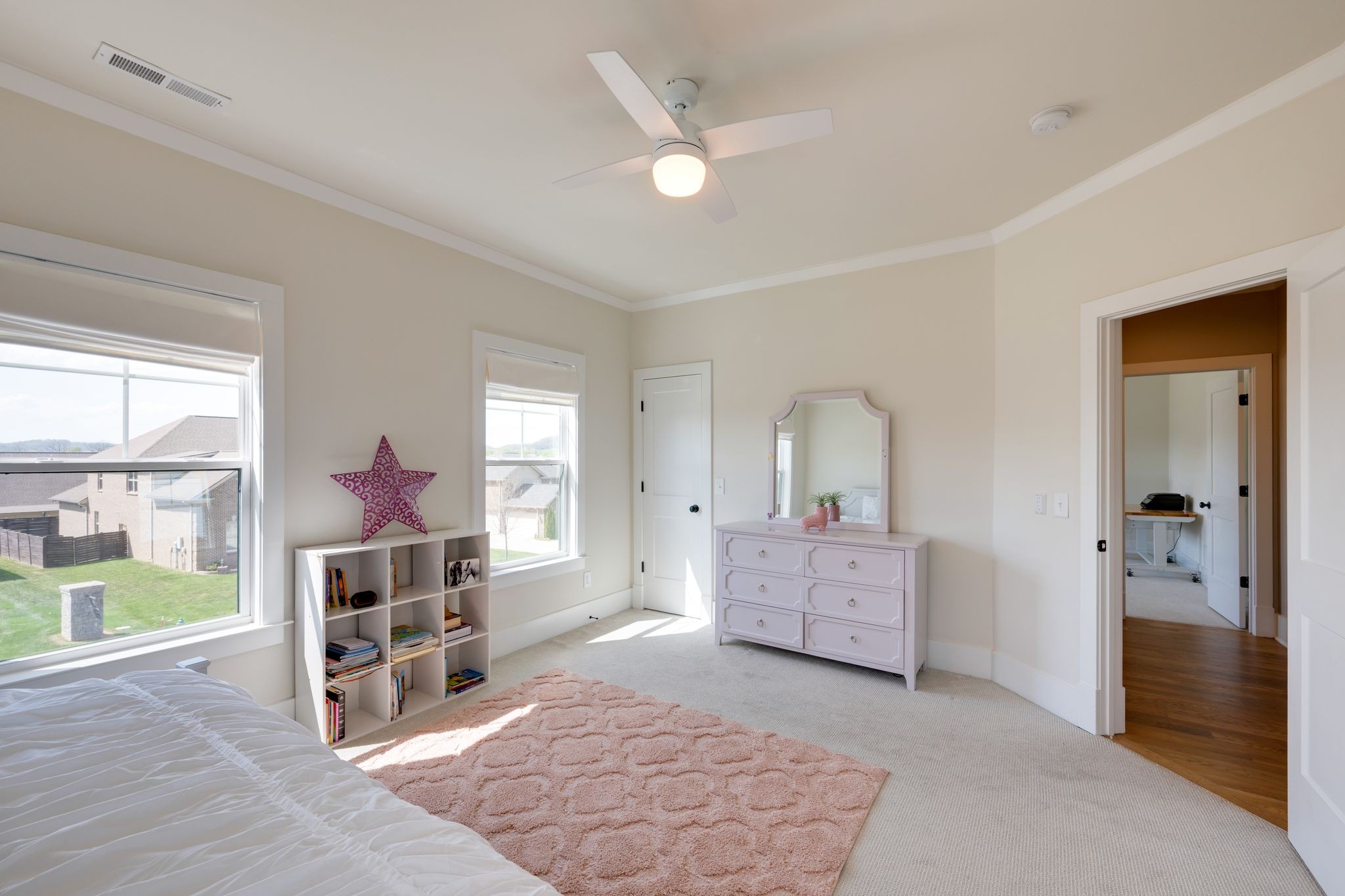 9011 Safehaven Place Spring Hill, TN 37174 - Photo 40 of 49 a living room with furniture and a baby crib