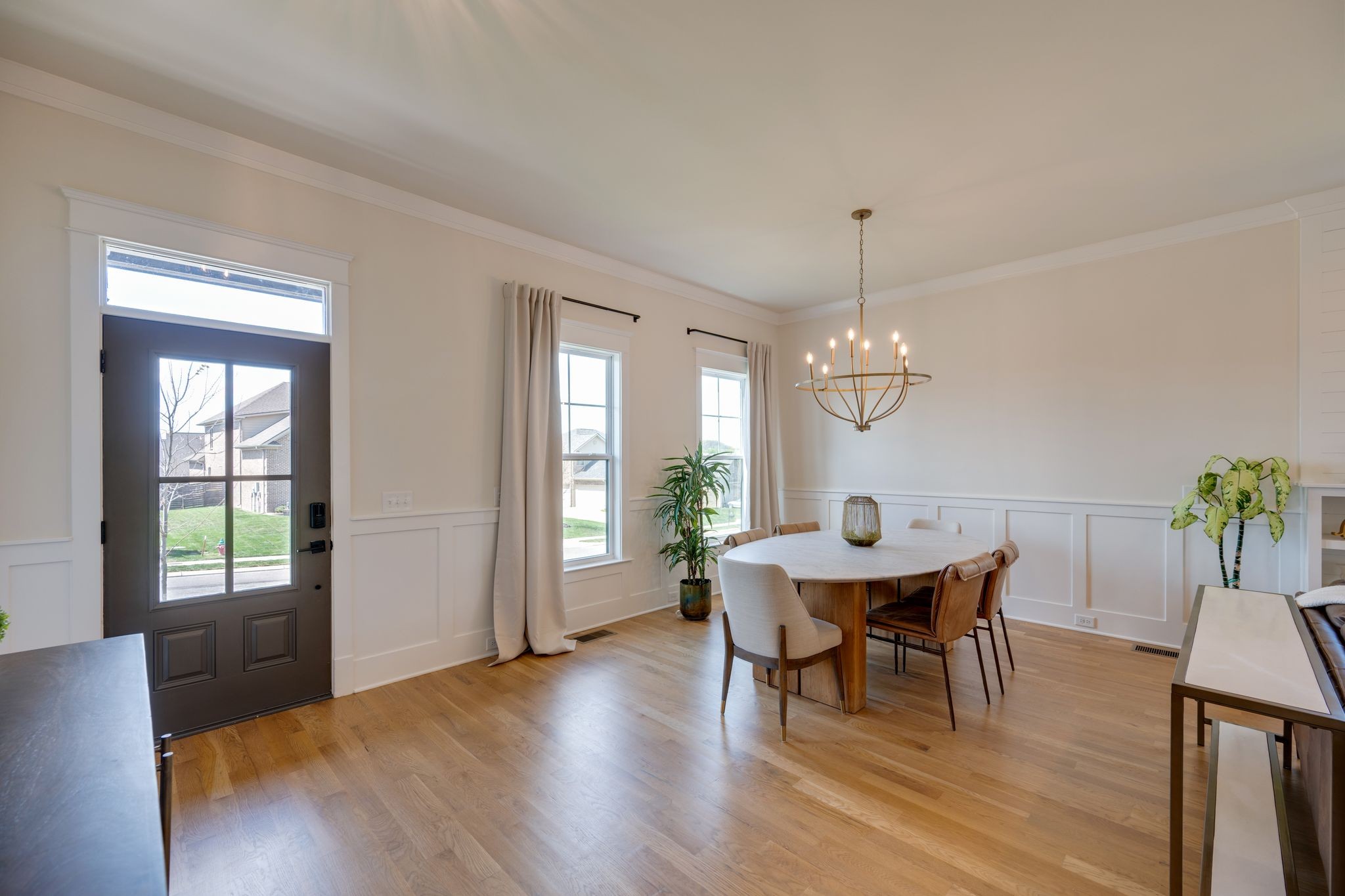9011 Safehaven Place Spring Hill, TN 37174 - Photo 6 of 49 a view of a dining room with furniture window and wooden floor