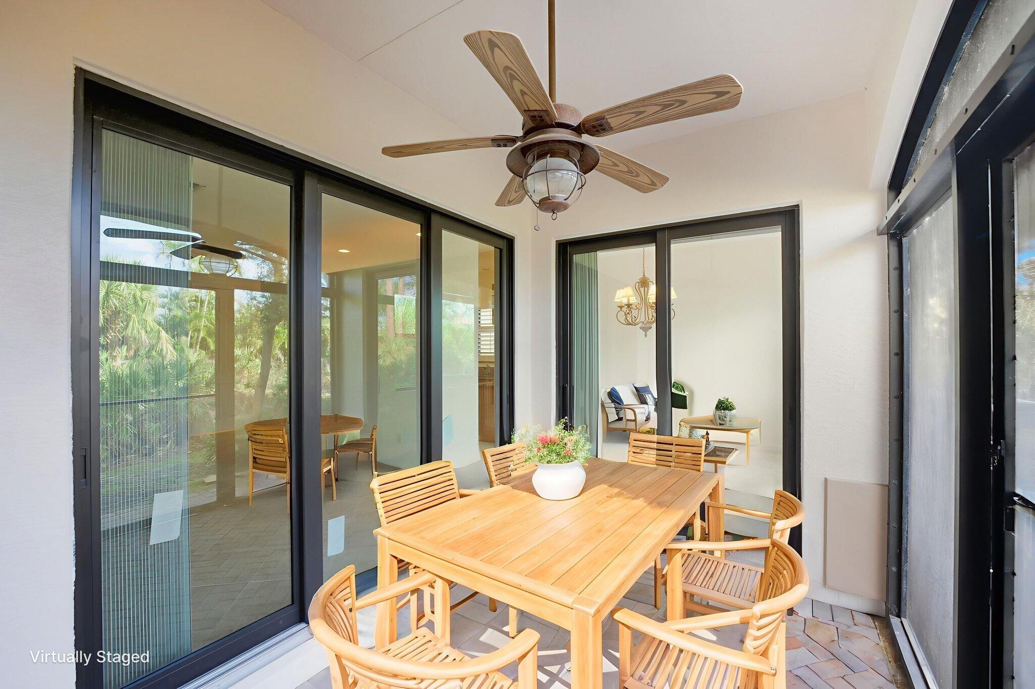 6675 Southeast Woodmill Pond Lane Stuart, FL 34997 - Photo 19 of 61 a dining room with large window