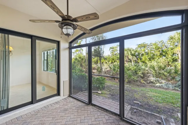 a view of a room with a large window