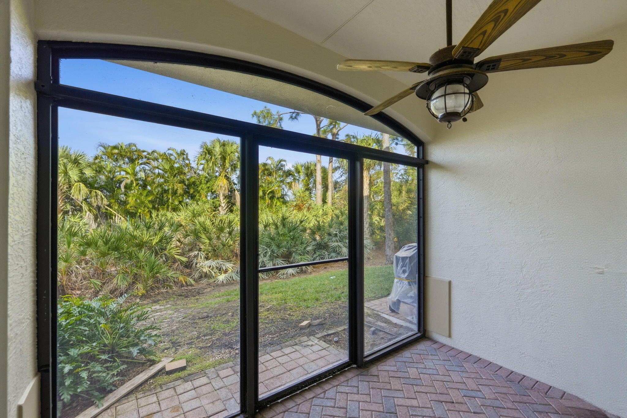 6675 Southeast Woodmill Pond Lane Stuart, FL 34997 - Photo 21 of 61 a view of a room with a large window