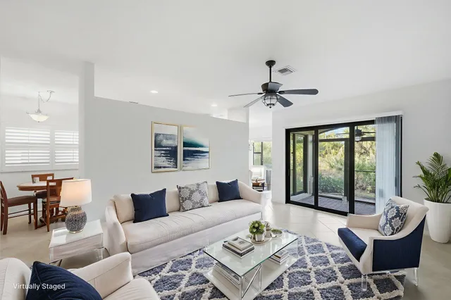 a kitchen with stainless steel appliances granite countertop a refrigerator stove and oven