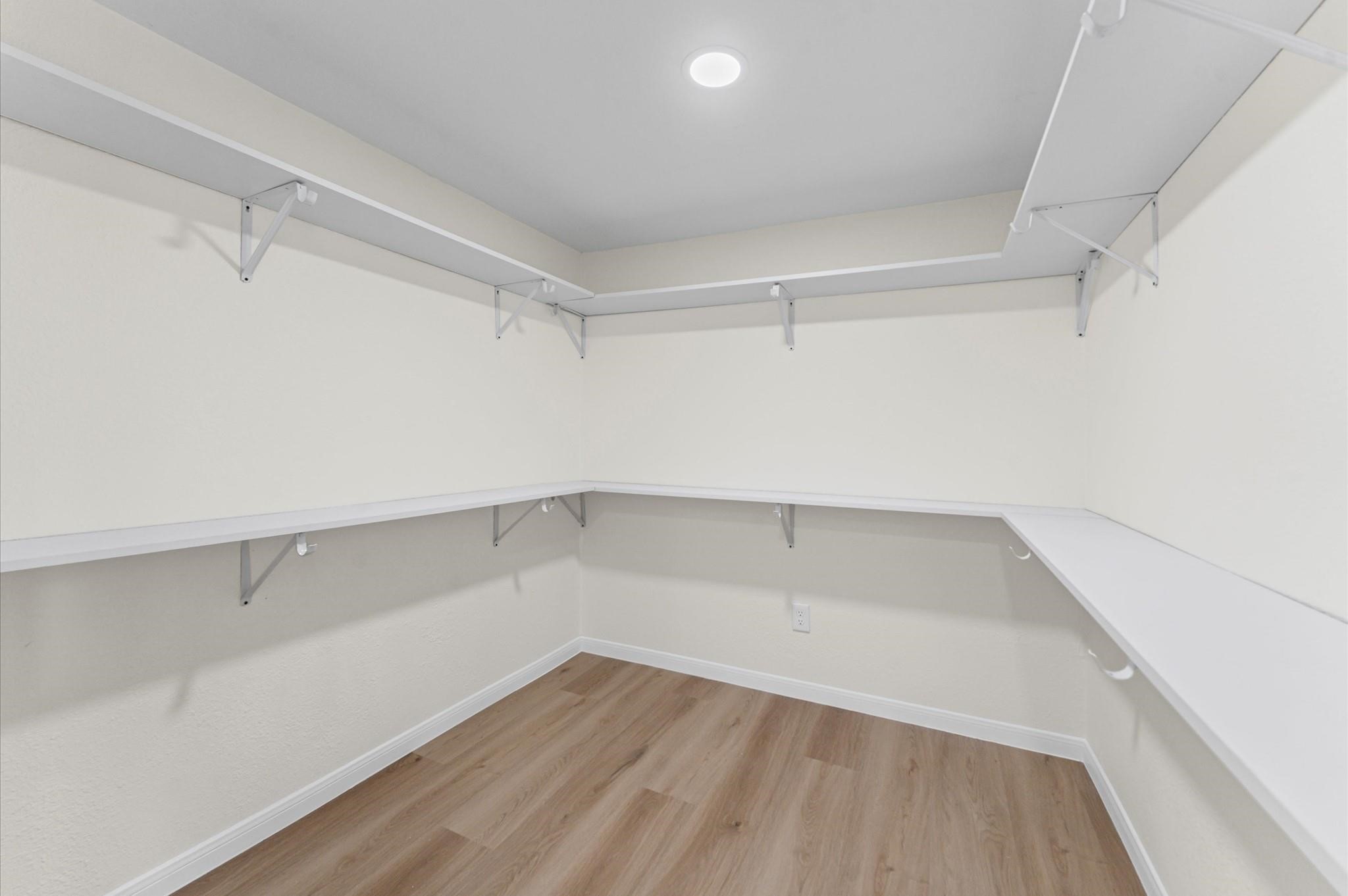 2914 Riata Lane Houston, TX 77043 - Photo 23 of 44 a view of an empty walk in closet