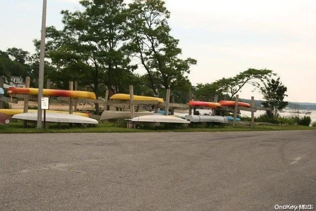 a view of street with parked cars