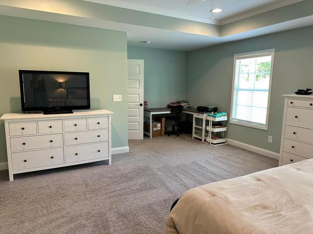 27 Veterans Court Fort Mitchell, AL 36856 - Photo 16 of 31 a bed room with a bed and a television