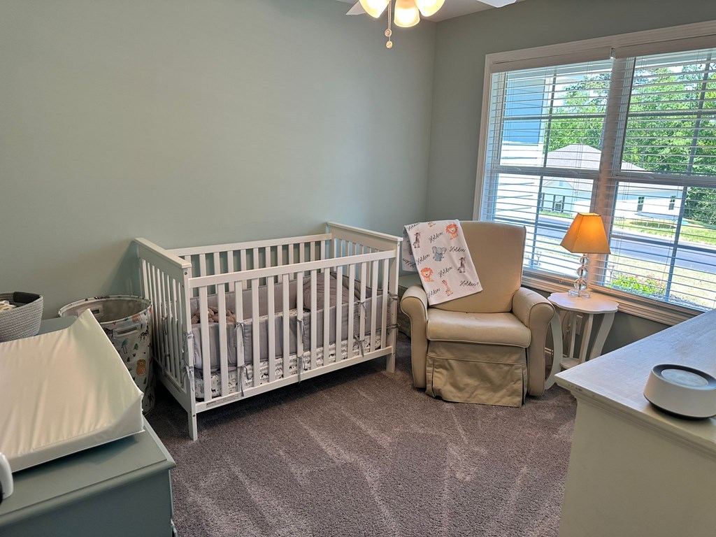 27 Veterans Court Fort Mitchell, AL 36856 - Photo 20 of 31 a bedroom with furniture and a window