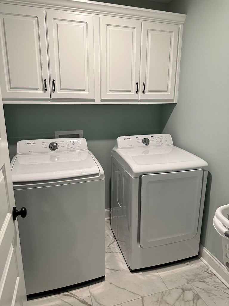 27 Veterans Court Fort Mitchell, AL 36856 - Photo 25 of 31 a utility room with dryer and washer