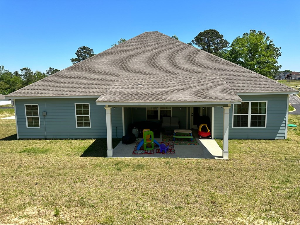 27 Veterans Court Fort Mitchell, AL 36856 - Photo 29 of 31 a view of a house with backyard porch and furniture