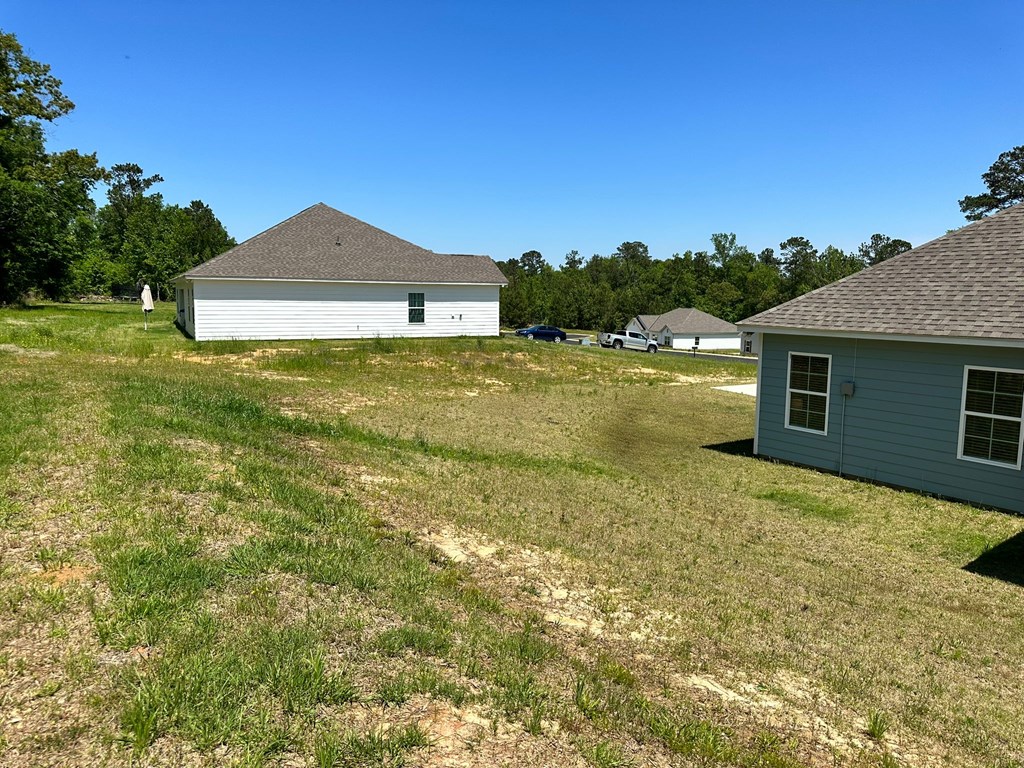 27 Veterans Court Fort Mitchell, AL 36856 - Photo 30 of 31 a front view of a house with a yard