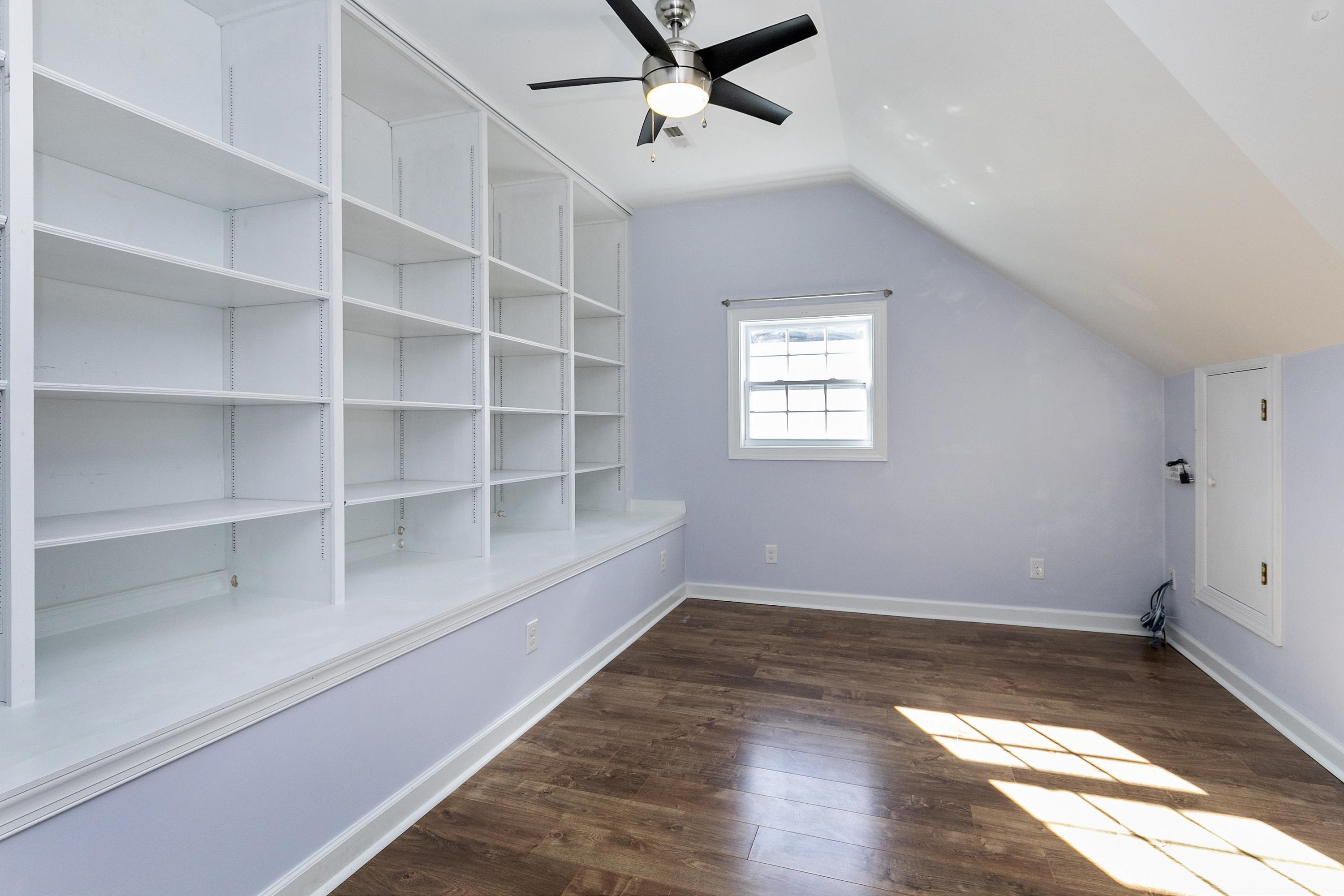 4412 Major Loring Way Raleigh, NC 27616 - Photo 34 of 59 WOW! Paint still drying.... ample floored attic storage off this room! Check out those shelves!! 4TH BEDROOM/OFFICE