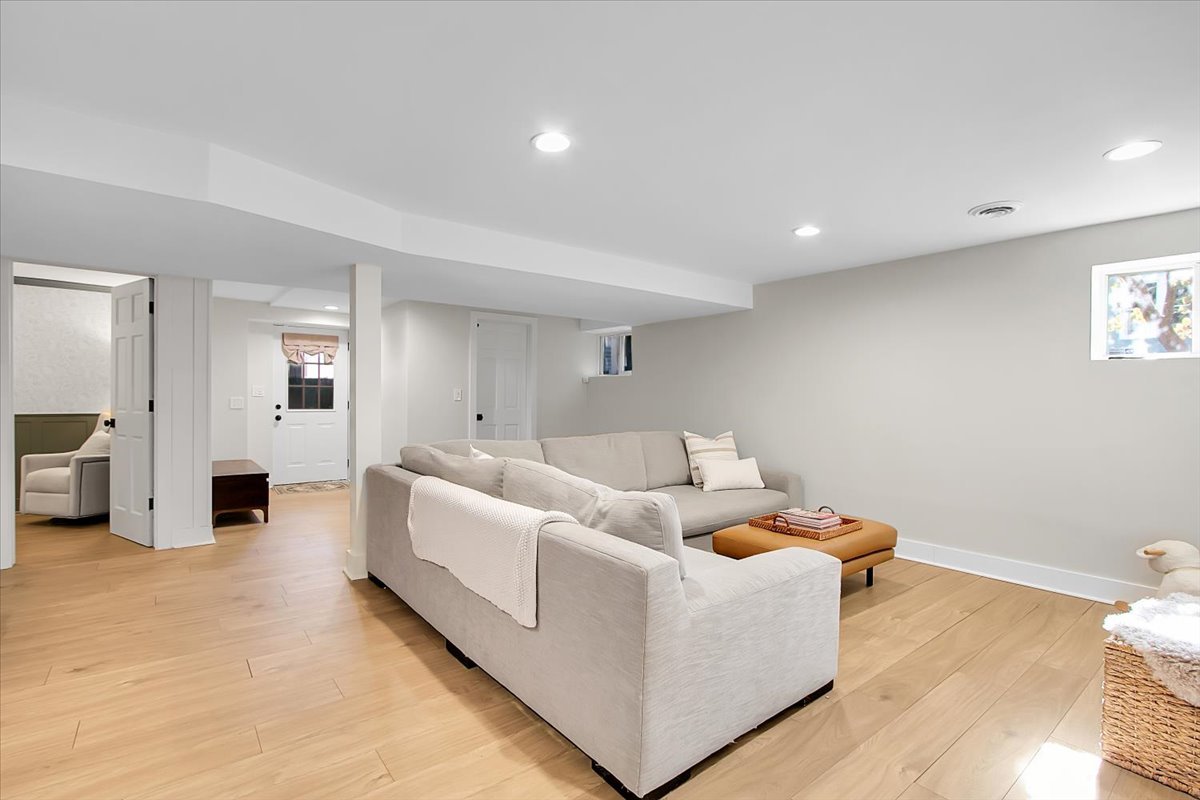143 Walnut Street Frankfort, IL 60423 - Photo 23 of 38 a living room with furniture and a wooden floor