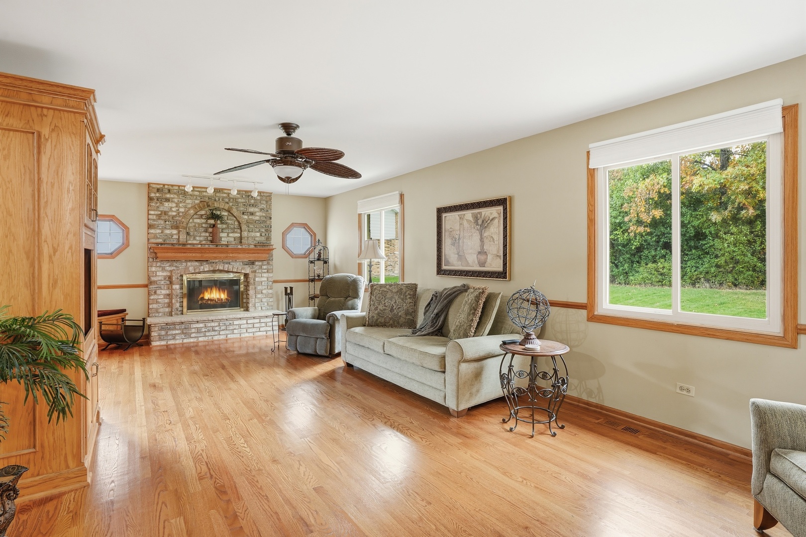 10 Zurich Court Crete, IL 60417 - Photo 18 of 37 a living room with furniture large window and wooden floor