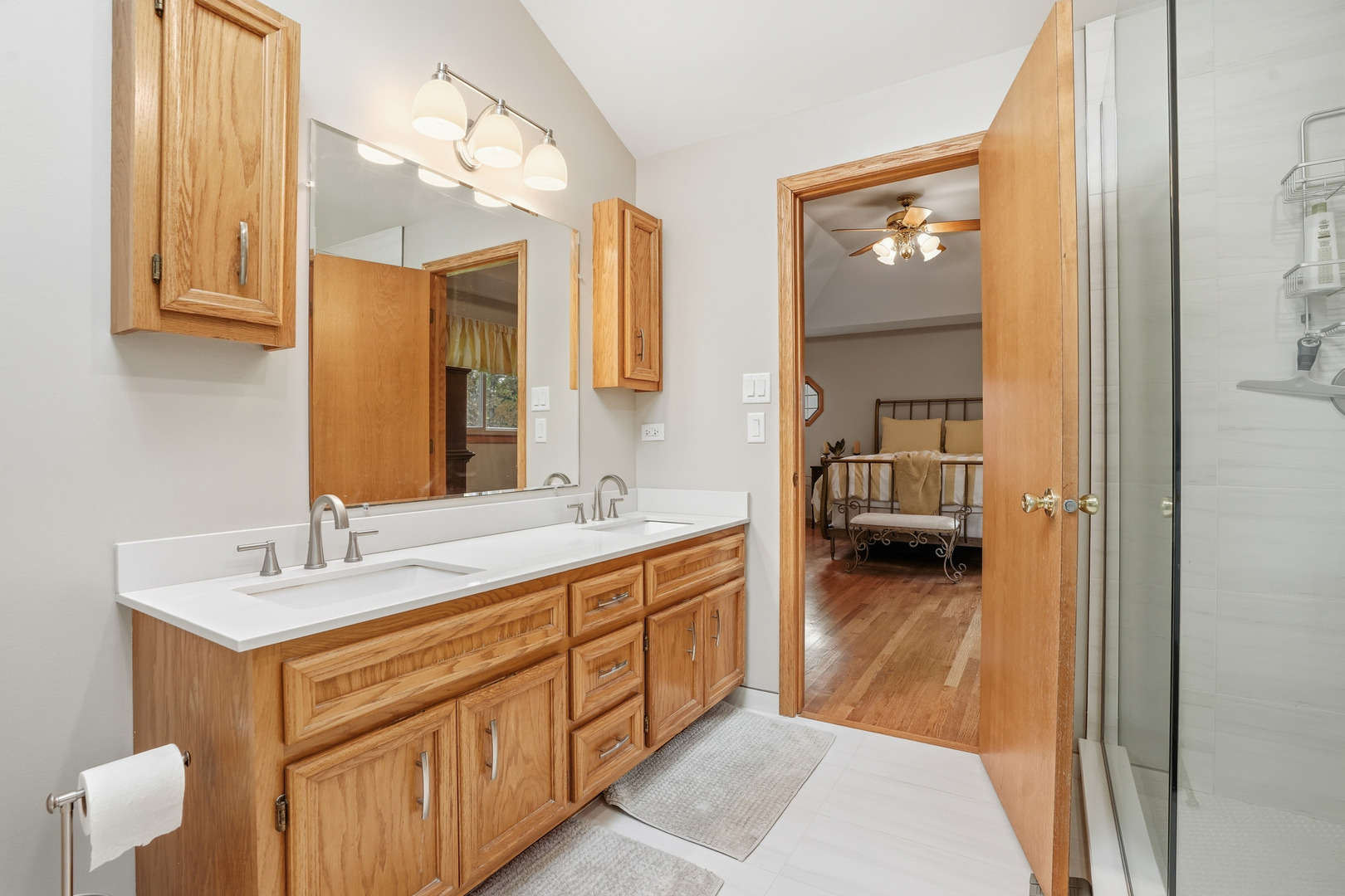 10 Zurich Court Crete, IL 60417 - Photo 27 of 37 a en suite bathroom with a double vanity sink and a mirror