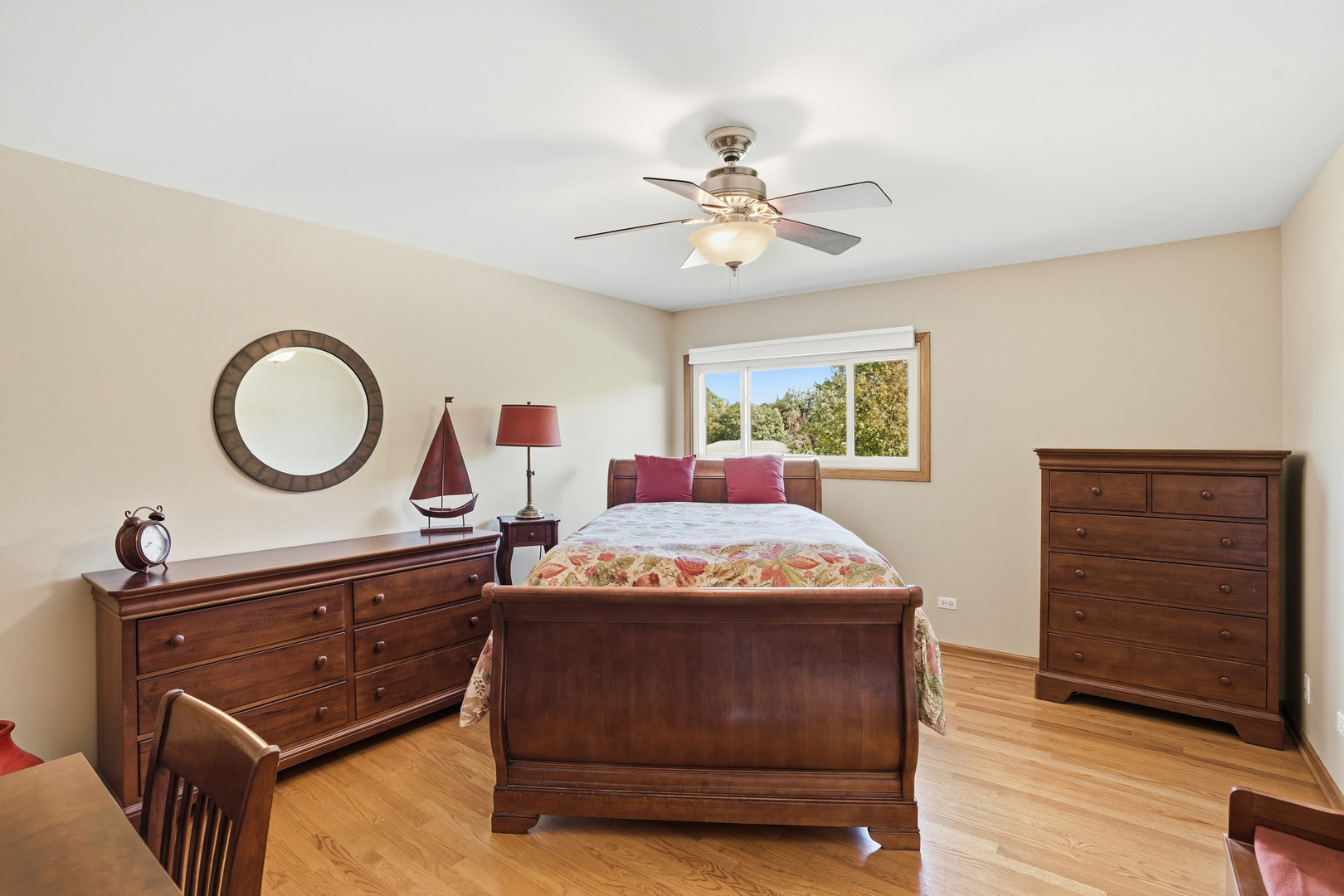 10 Zurich Court Crete, IL 60417 - Photo 31 of 37 a bed room with a bed and a dresser