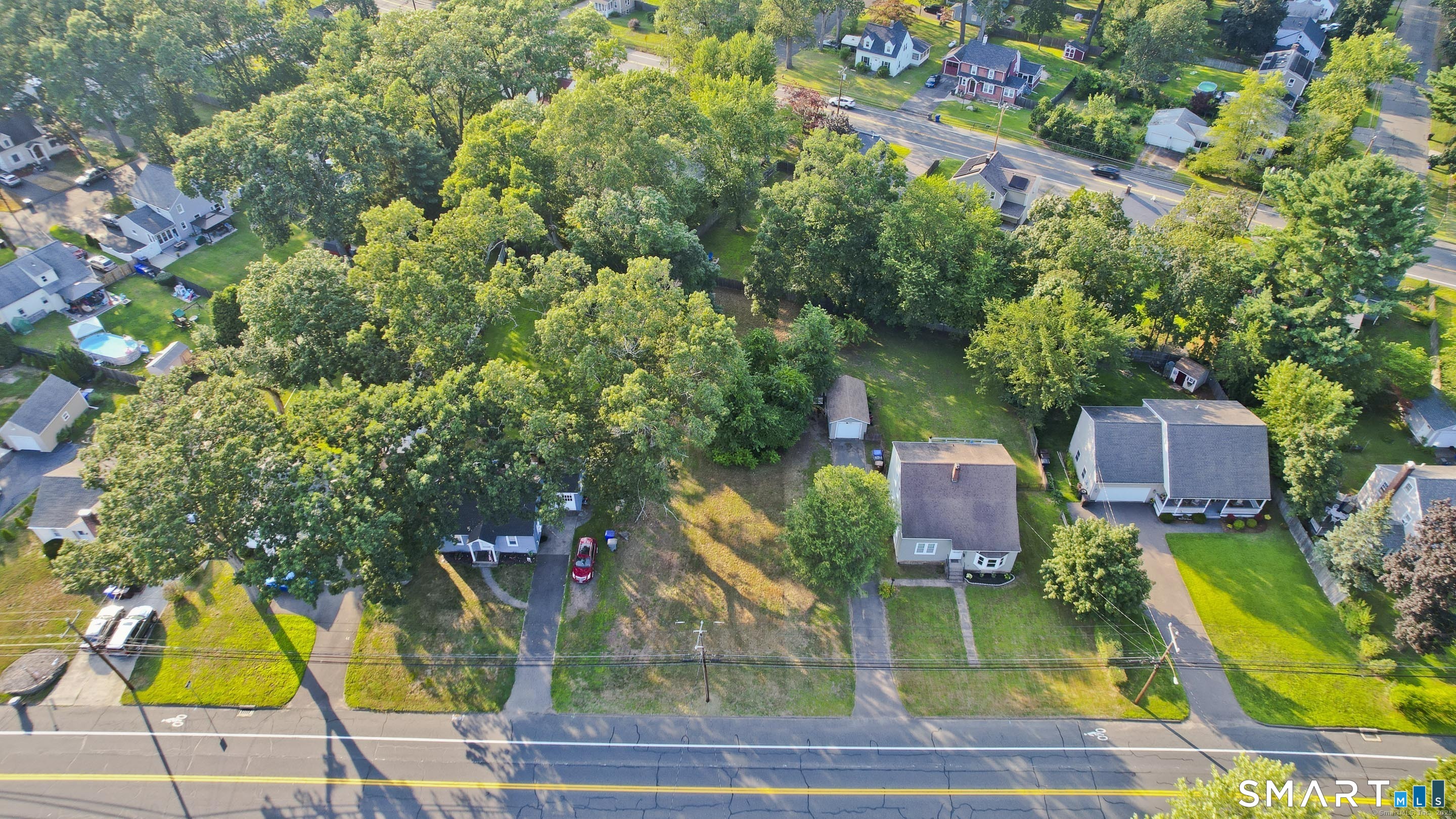 10 1/2 South Road Enfield, CT 06082 - Photo 12 of 20 an aerial view of a house with swimming pool and chair