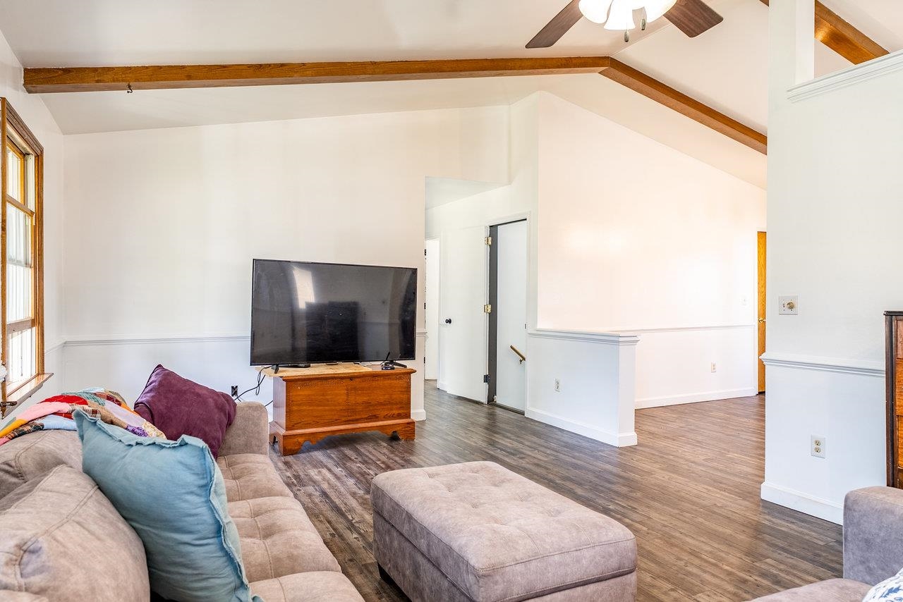 8213 Robinson Road Dayton, VA 22821 - Photo 11 of 75 a living room with furniture and a flat screen tv