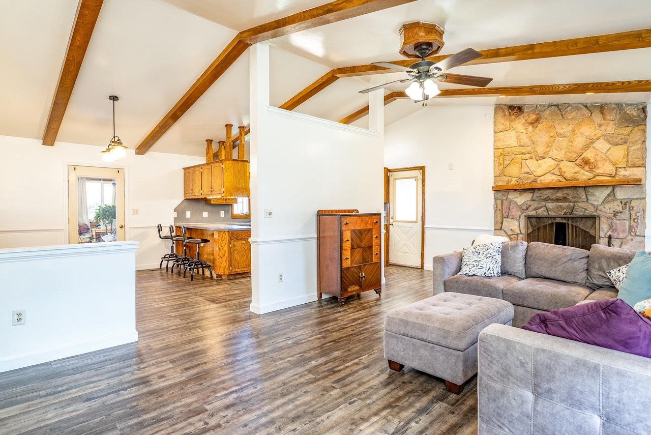 8213 Robinson Road Dayton, VA 22821 - Photo 12 of 75 a living room with furniture and a fireplace