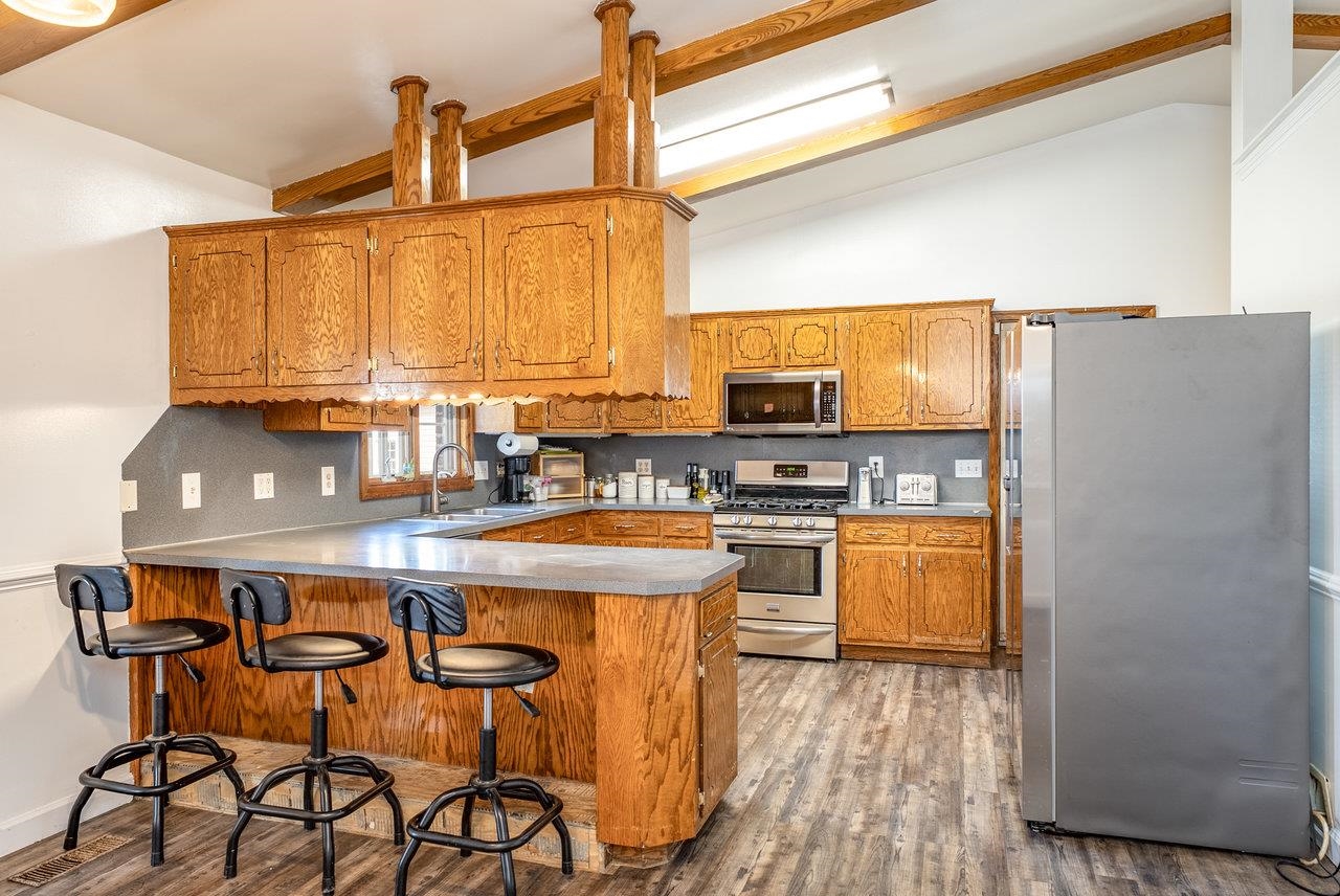 8213 Robinson Road Dayton, VA 22821 - Photo 13 of 75 a kitchen with stainless steel appliances a stove a sink and a refrigerator