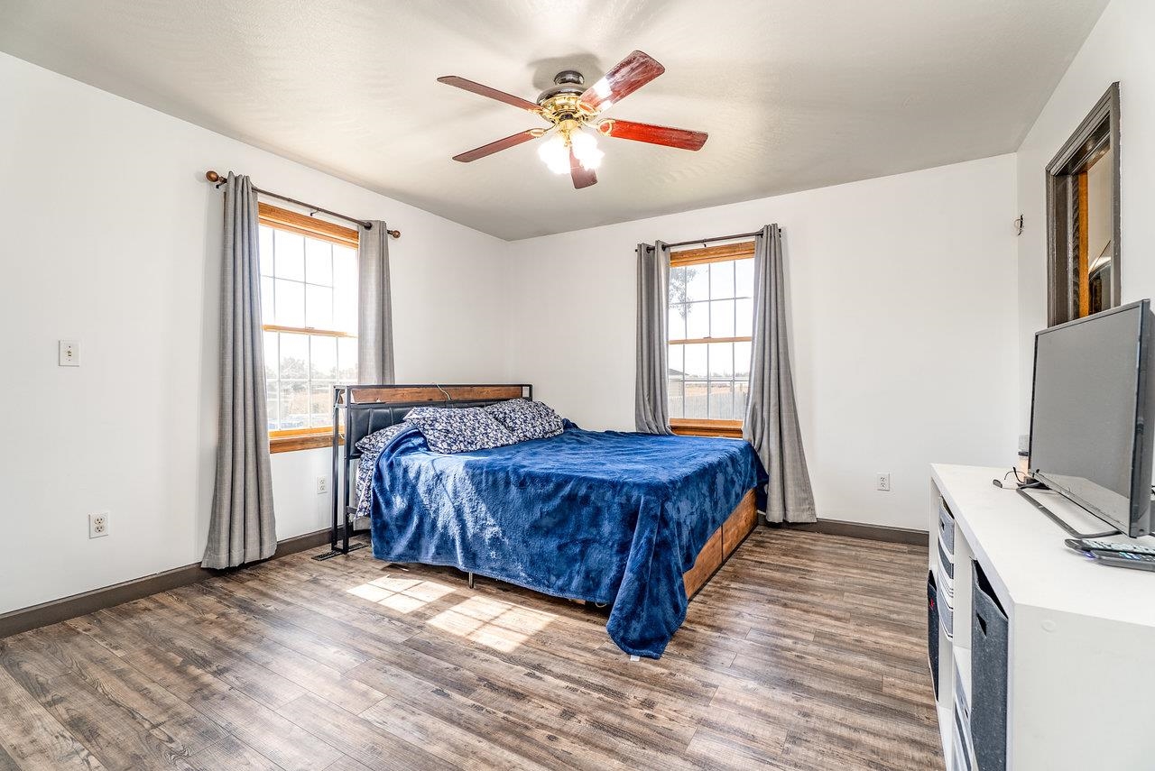 8213 Robinson Road Dayton, VA 22821 - Photo 28 of 75 a bedroom with a bed and a chandelier