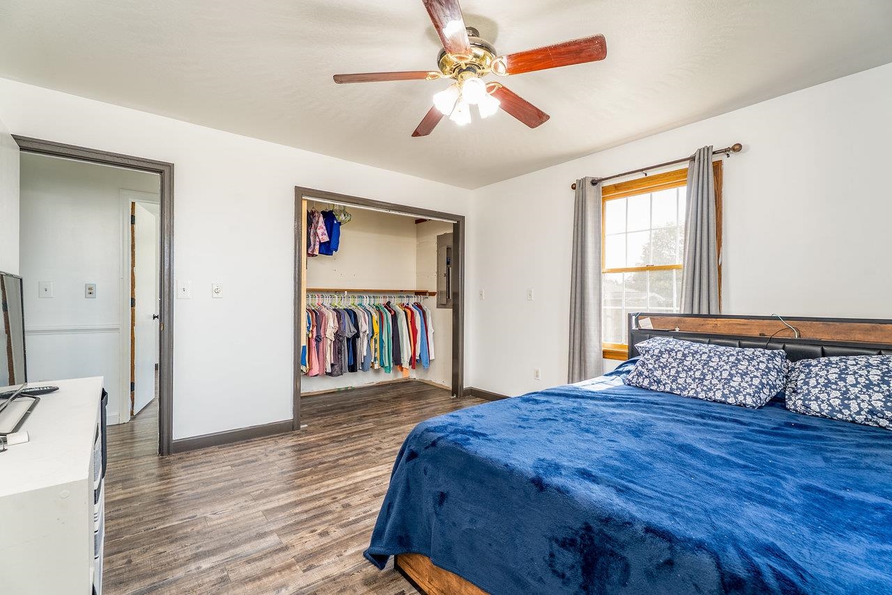 8213 Robinson Road Dayton, VA 22821 - Photo 29 of 75 a bedroom with a bed and a book shelf