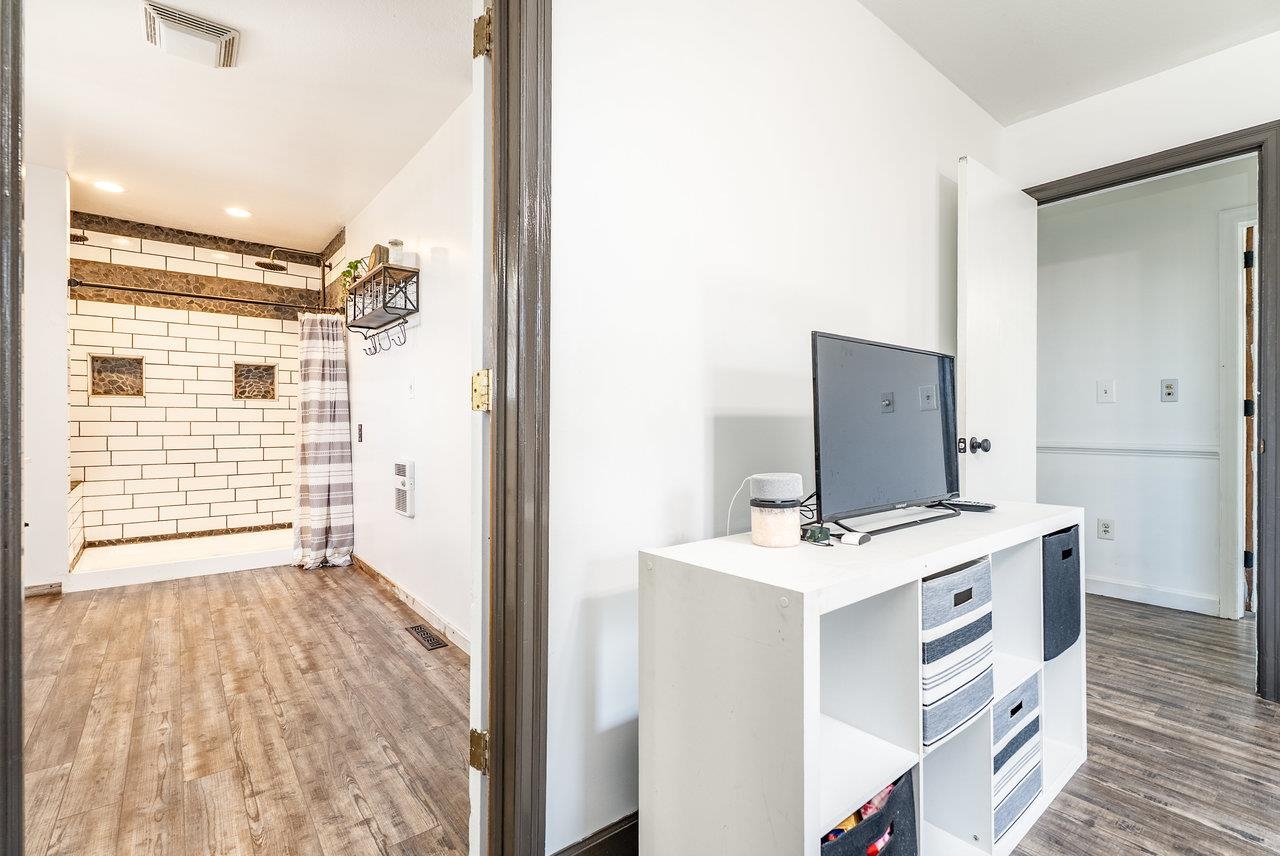 8213 Robinson Road Dayton, VA 22821 - Photo 31 of 75 a view of kitchen and utility room with wooden floor