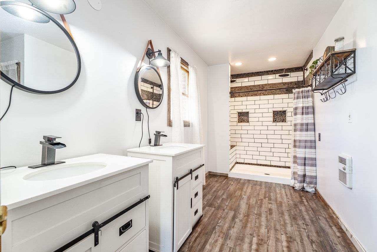 8213 Robinson Road Dayton, VA 22821 - Photo 32 of 75 a bathroom with a sink and a mirror