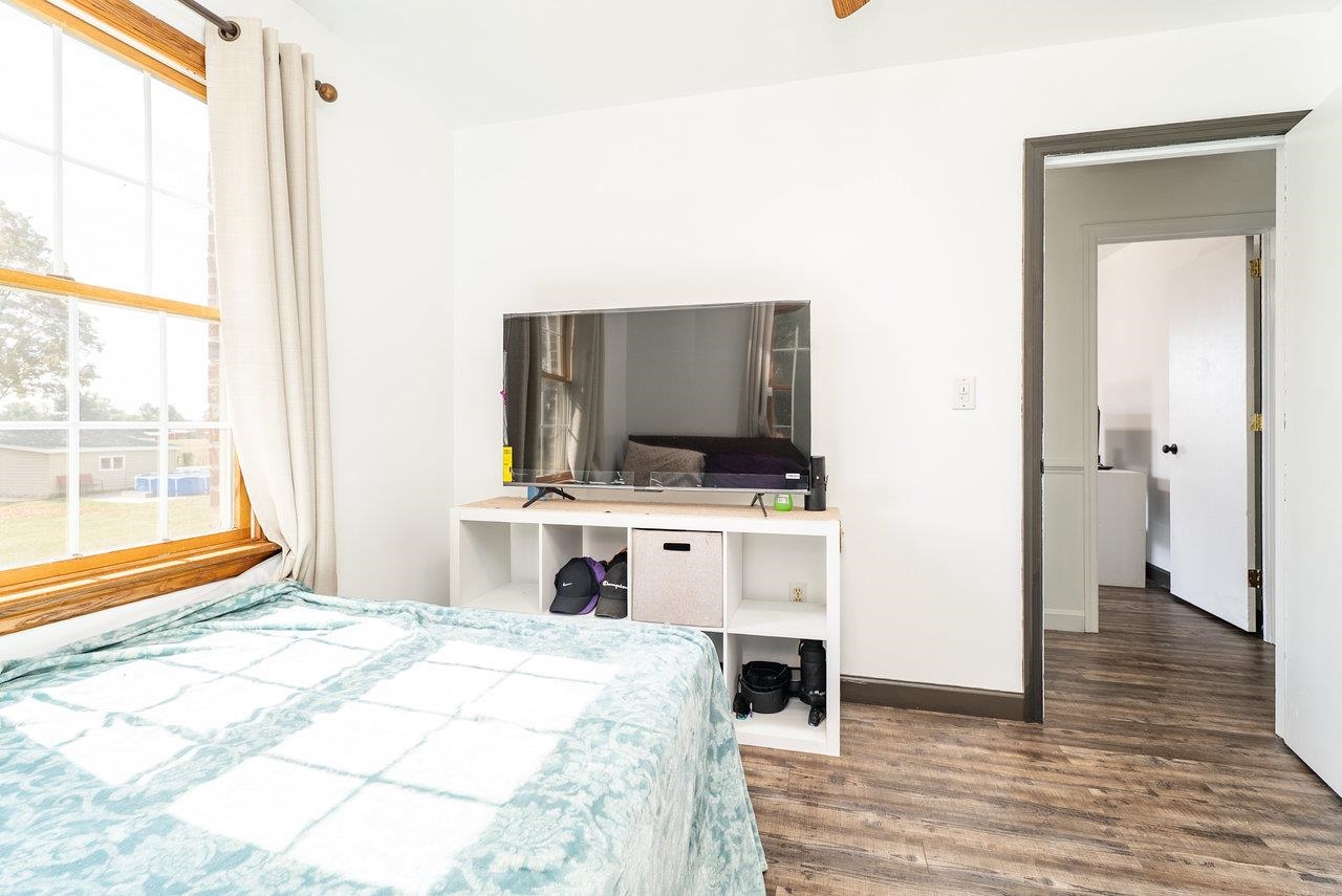 8213 Robinson Road Dayton, VA 22821 - Photo 36 of 75 a bedroom with a bed and a flat screen tv