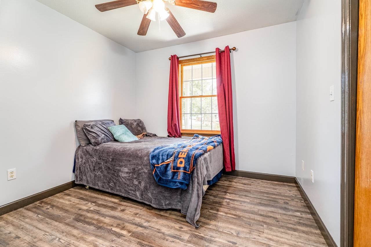 8213 Robinson Road Dayton, VA 22821 - Photo 38 of 75 a spacious bedroom with a bed and a window