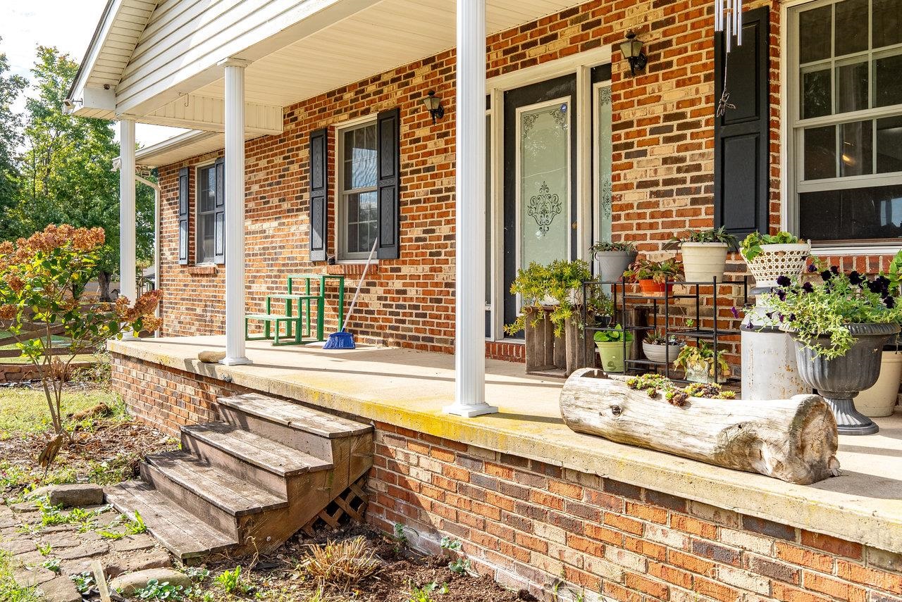 8213 Robinson Road Dayton, VA 22821 - Photo 4 of 75 a view of a house with a lounge chair