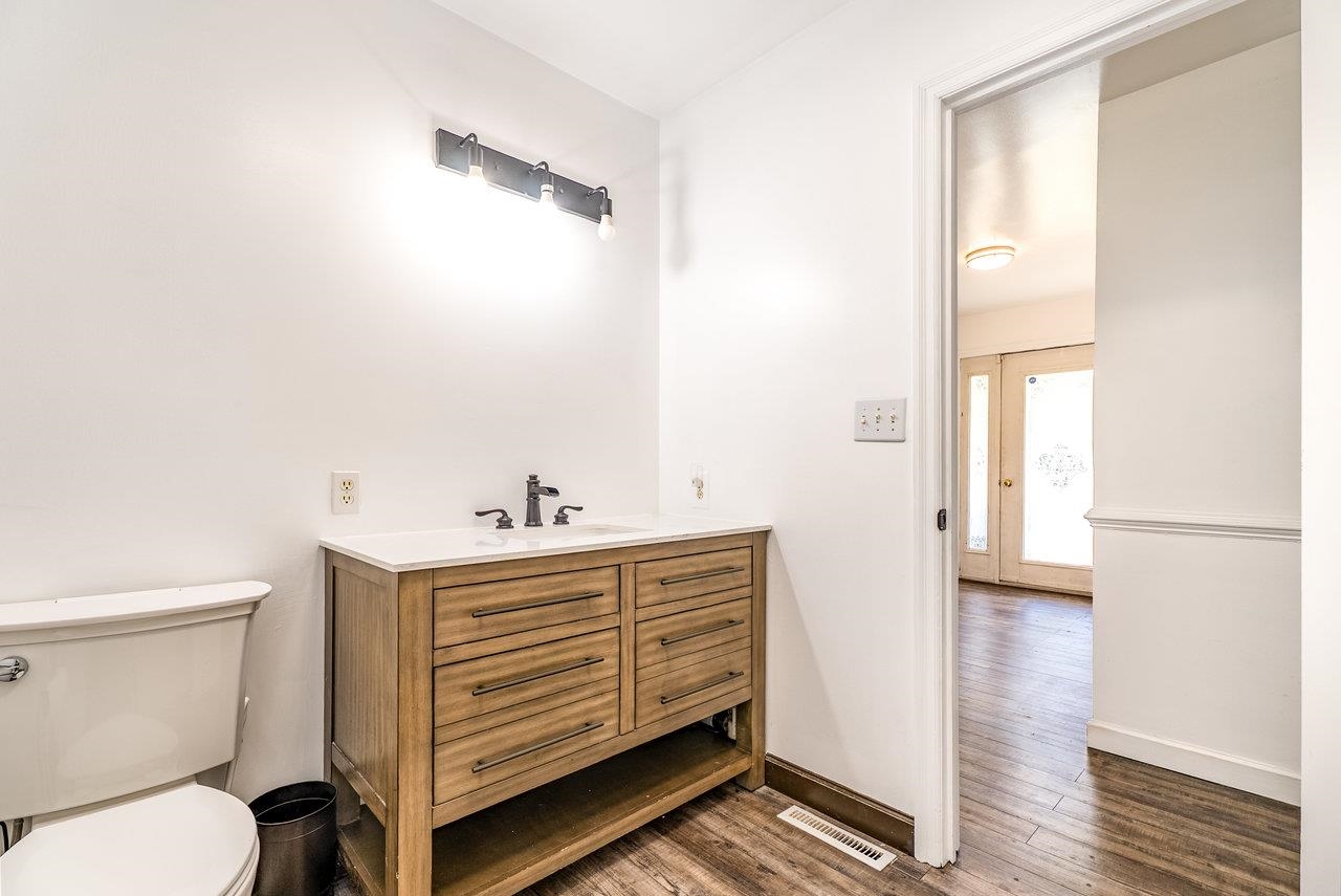 8213 Robinson Road Dayton, VA 22821 - Photo 43 of 75 a bathroom with a sink a toilet and a mirror