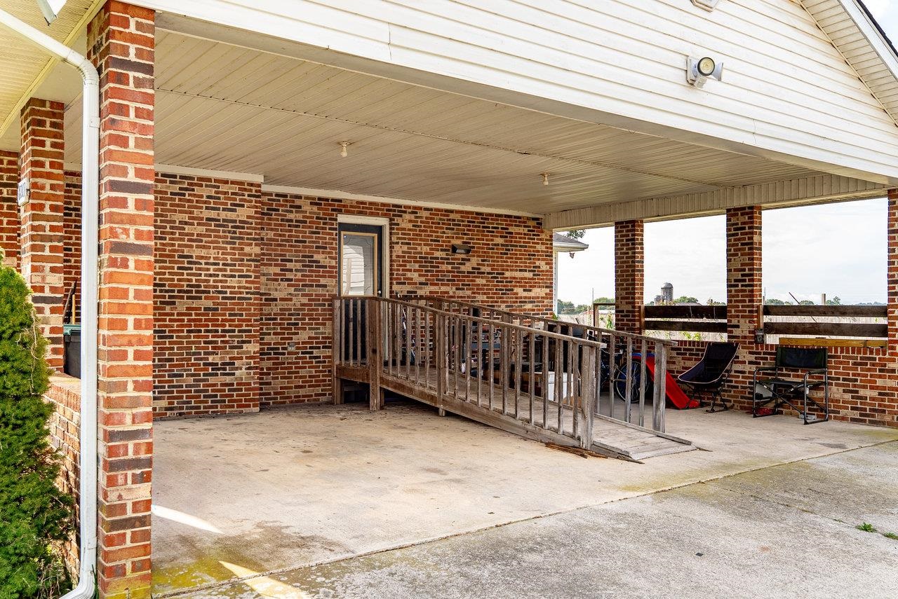 8213 Robinson Road Dayton, VA 22821 - Photo 62 of 75 a view of a porch with wooden floor