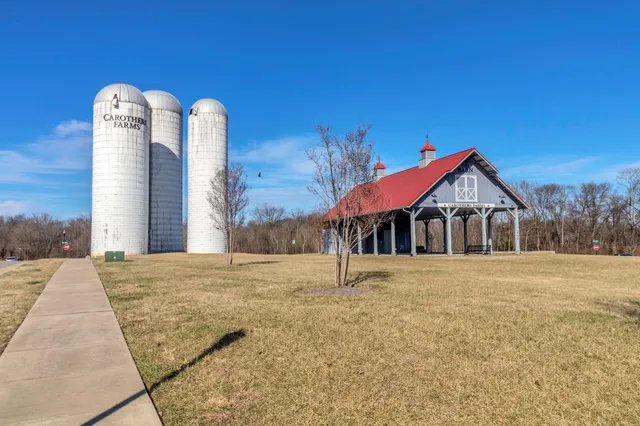 a view of outdoor space with seating and trees