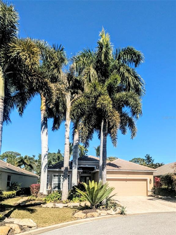 124 Turquoise Lane Osprey, FL 34229 - Photo 3 of 48 a view of a street with houses