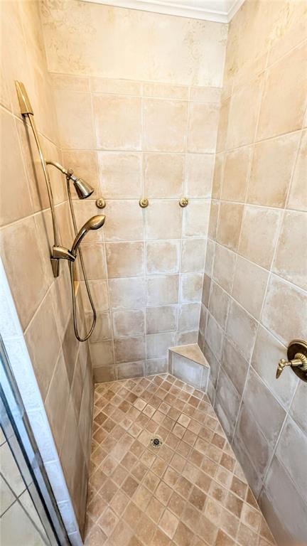 124 Turquoise Lane Osprey, FL 34229 - Photo 34 of 48 a bathroom with a shower