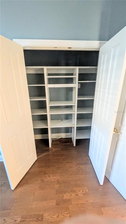 124 Turquoise Lane Osprey, FL 34229 - Photo 41 of 48 a view of walk in closet with empty racks