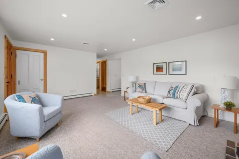 a living room with furniture and a couch