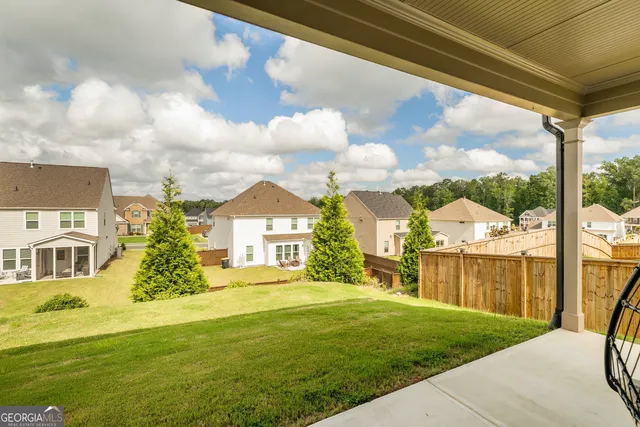 a view of a house with a big yard